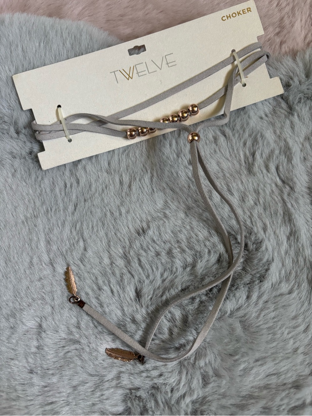 Twelve light gray suede wrap layered beaded choker